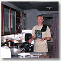 Tim whips up dinner chez bus